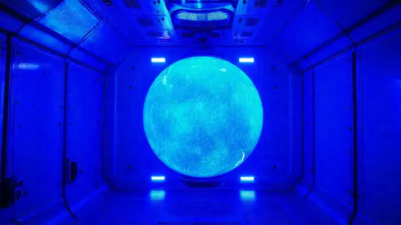 Esfera azul luminosa en cámara de alta seguridad
