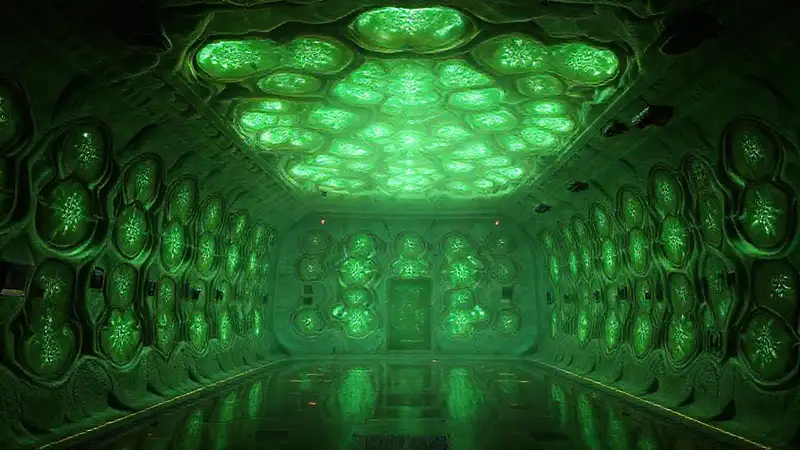 Estructura orgánica luminosa en cámara futurista