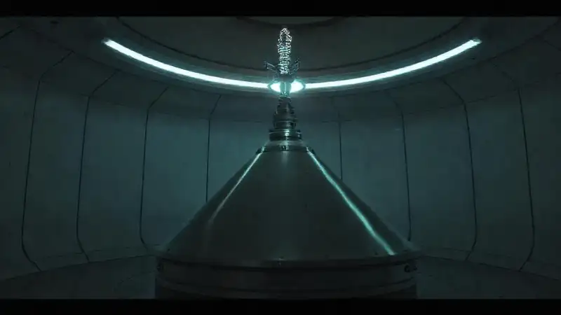 Cono metálico y radiación en entorno surreal